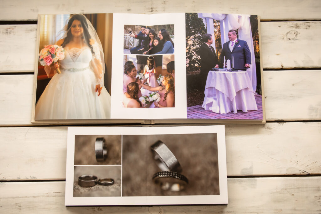 Atlanta wedding photographer displays different album sizes and why it's important to invest in an album. 