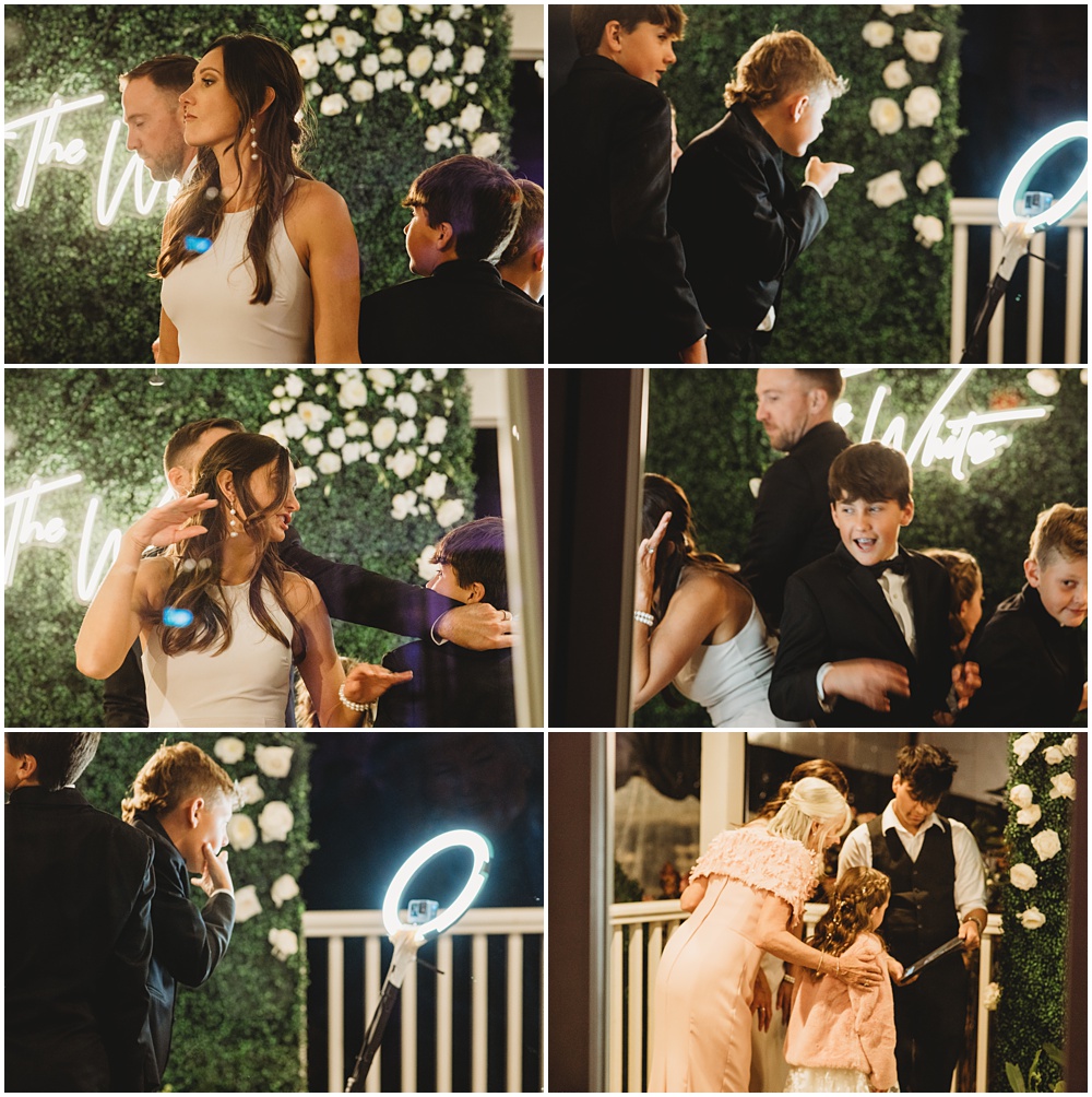 wedding at Half Mile Farm Venue in highlands, North Carolina. guest having fun on a photo booth during reception. Photo by Paul Ashton Photography