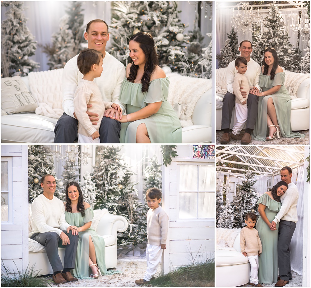 a family of three poses for Christmas photos during their enchanted greenhouse session at Mayberry Acres in Canton, Ga