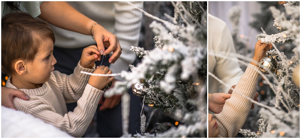 a family of three poses for Christmas photos during their enchanted greenhouse session at Mayberry Acres in Canton, Ga