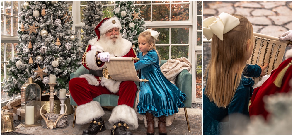 litting girl, sitting next to Santa, finding her name on his scroll during a Santa mini session at Prospect Farms, in Lawrenceville, Ga