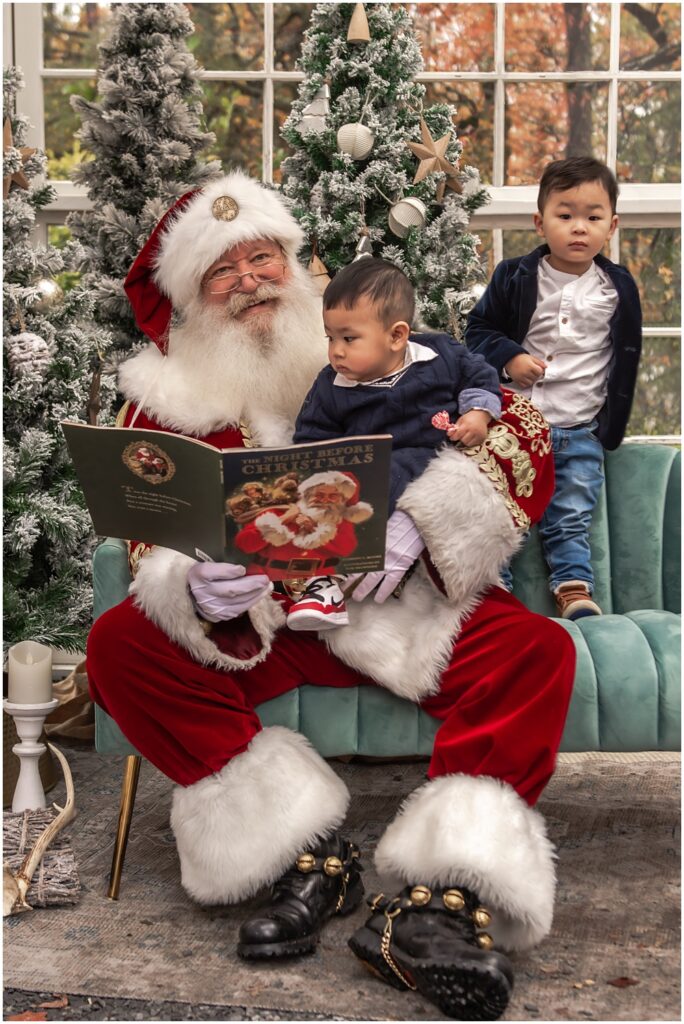 young boys sitting with Santa, during his Santa mini session at Prospect Farms, in Lawrenceville, Ga 