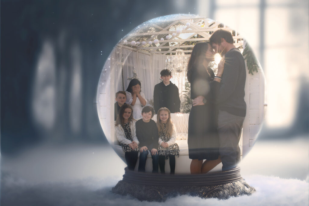 composite of family mini session inside of a snow globe for christmas minis 