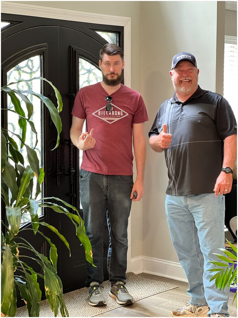 my husband and his brother coming in from hiding eggs for the kids. They were both thrilled 