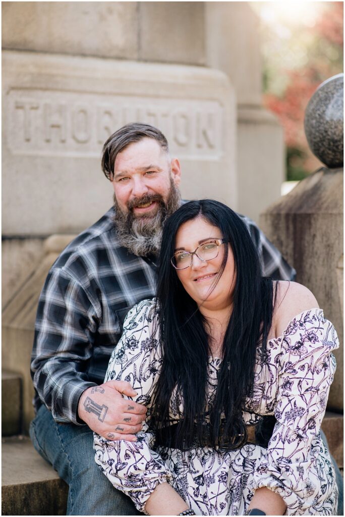 Bride & Groom posing on steps during an engagement session at Oakland Cemetery in Atlanta georgia. Goth bride 2025