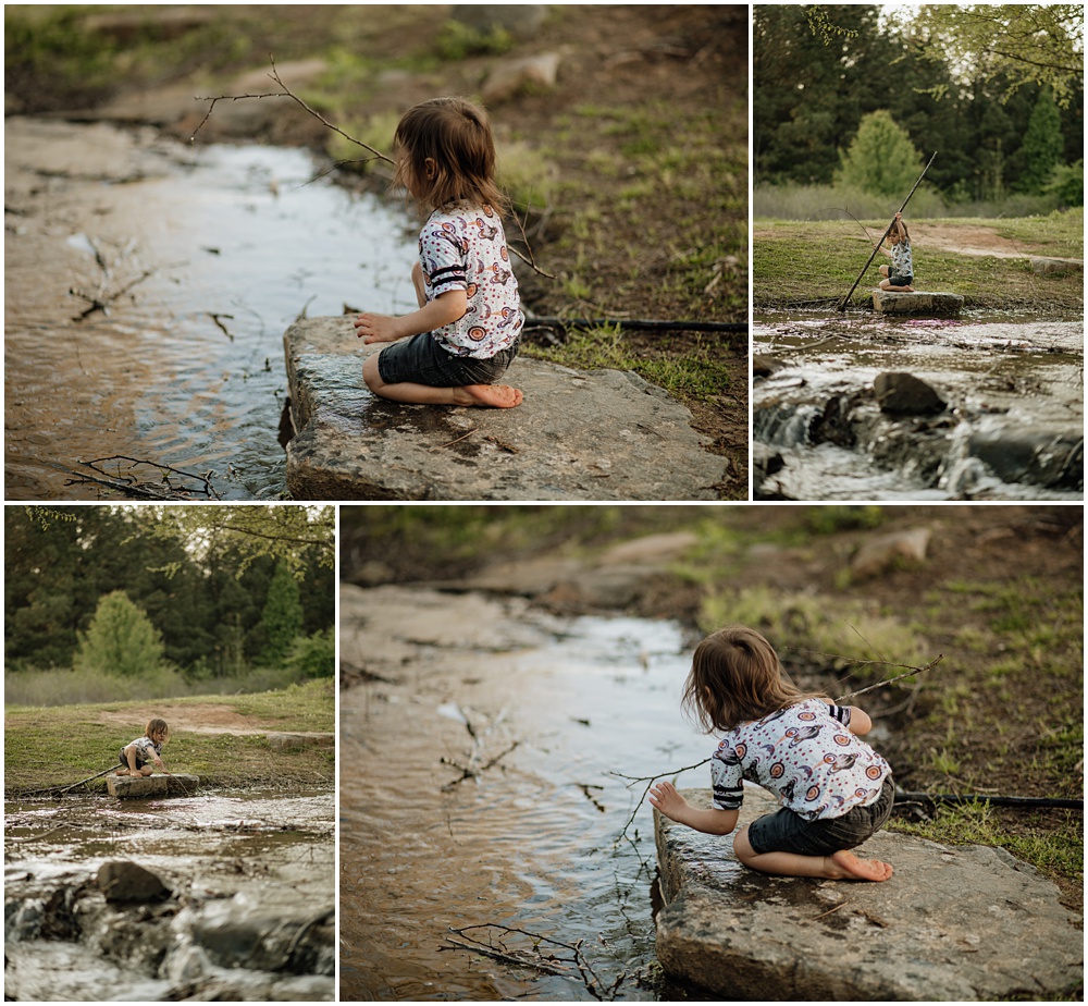 little boy playing on a rock near a creek during his mommy and me session at Gerrard landing park 