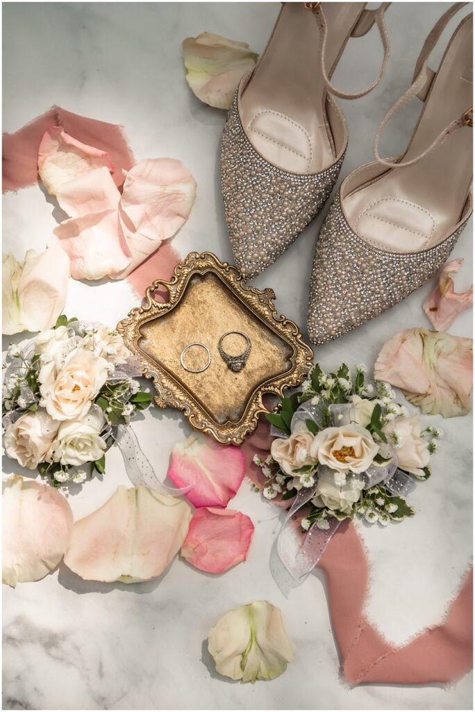 Atlanta wedding photographer photographs the Bride's shoes and wedding rings as part of their wedding details. 