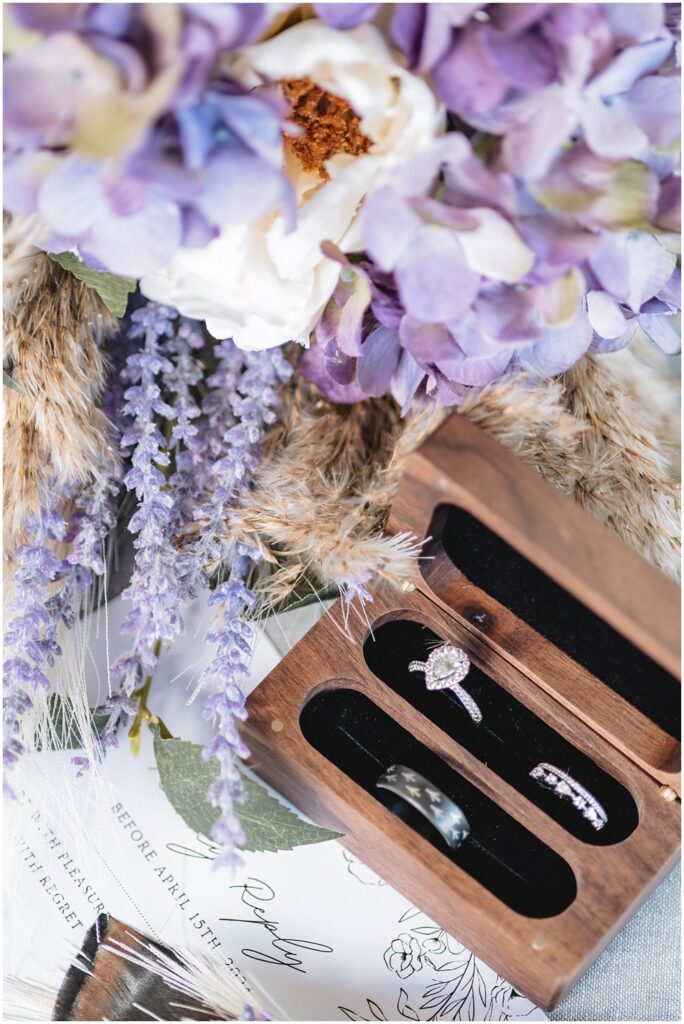 North Georgia photographer photographs the wedding details including the wedding bouquet and wedding rings