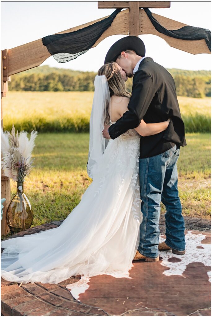 North Georgia photographer photographs the Bride and Groom's first kiss